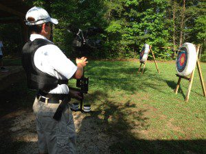 Jarod Latch takes video at YMCA Camp Harrison.